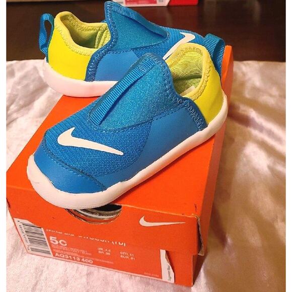 Nike Lil' Swoosh blue and yellow slip on toddler sneaker - Picture 1 of 4